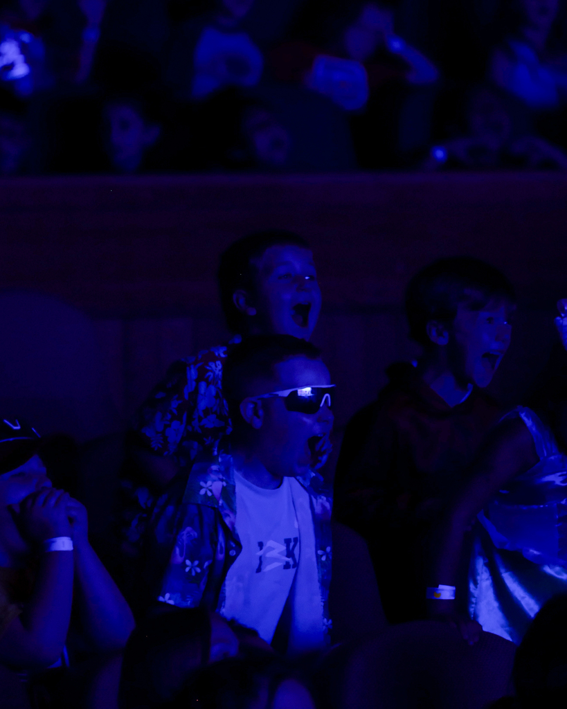 Elementary students interacting with ocean show