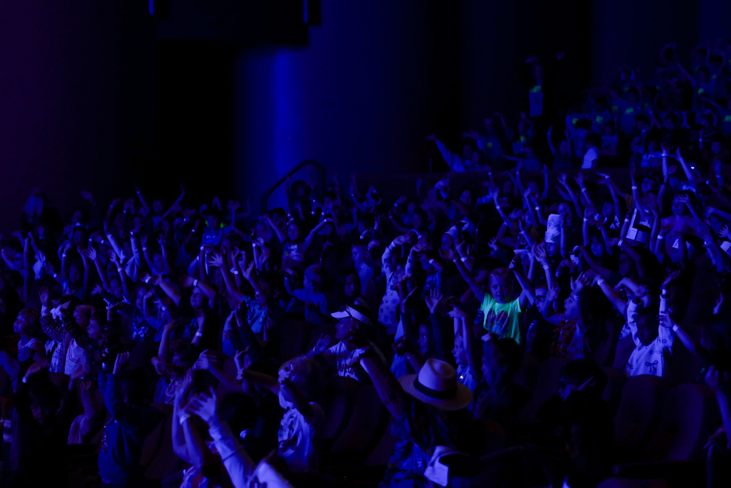 Elementary students interacting with ocean show