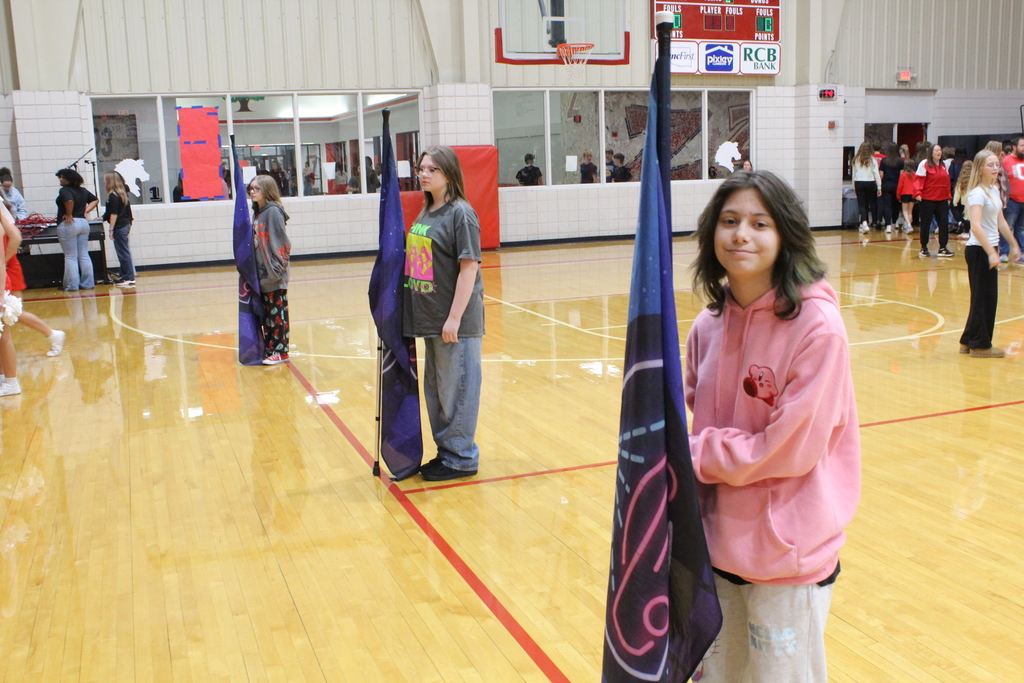WRJH Color guard at a pep assembly