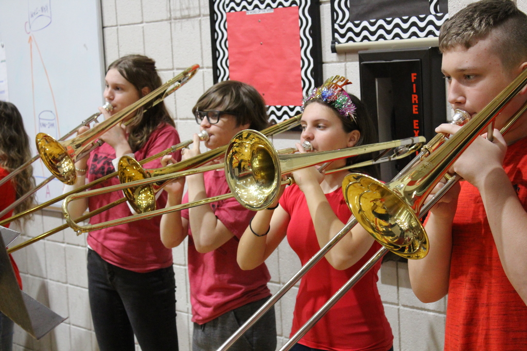 WRJH Trombone players playing at an assembly