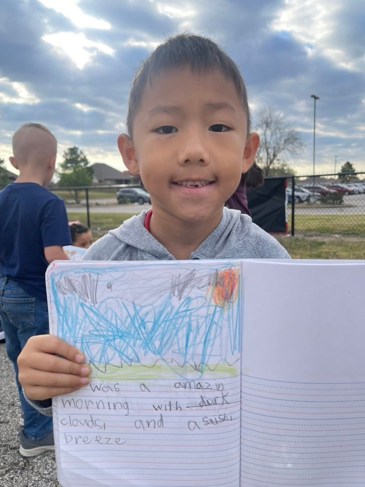 First grader's having class outside.
