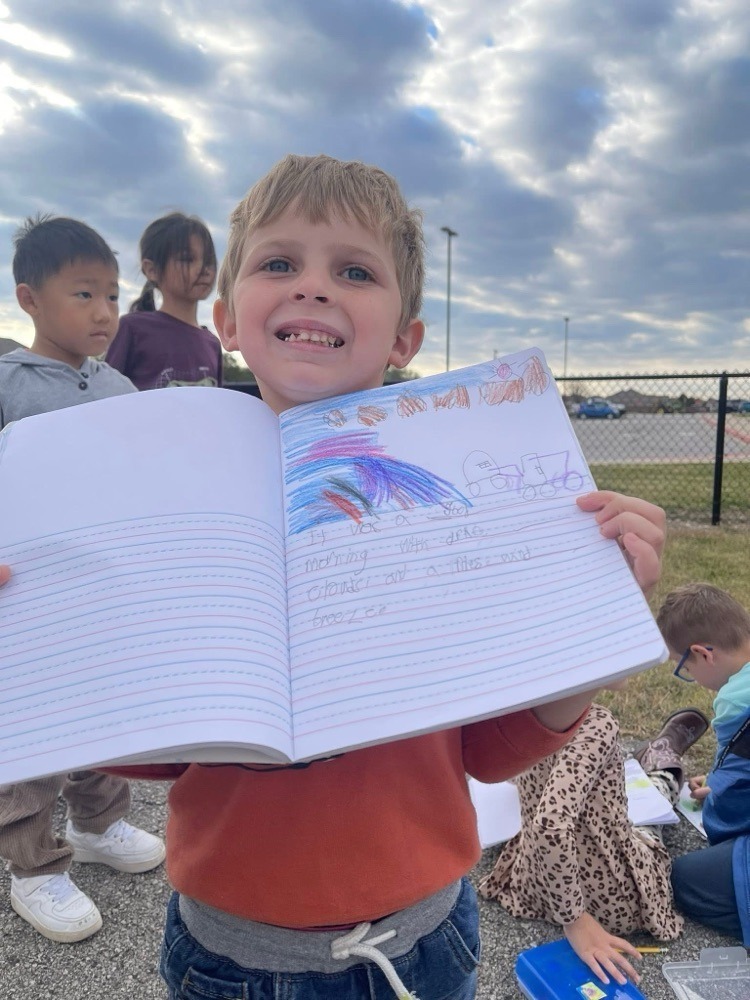 First grader's having class outside.