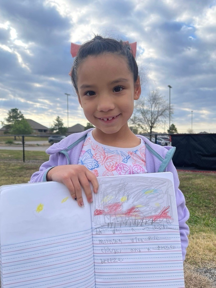 First grader's having class outside.