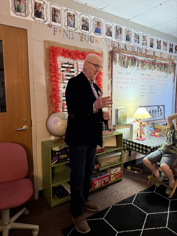 students listening to Mr McGuire