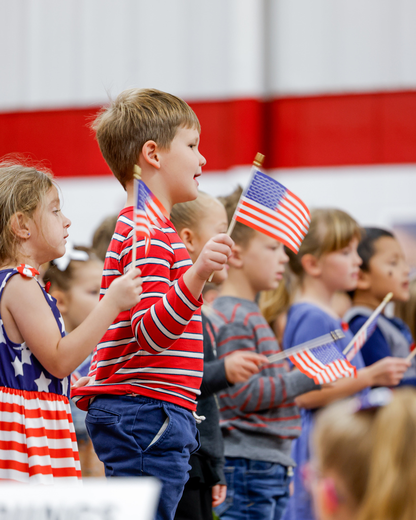 Elementary students celebrating Veteran's Day