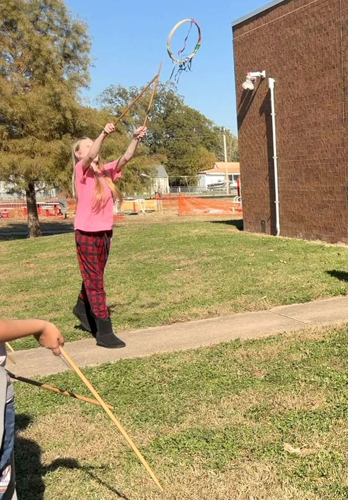 students playing traditional Cherokee games