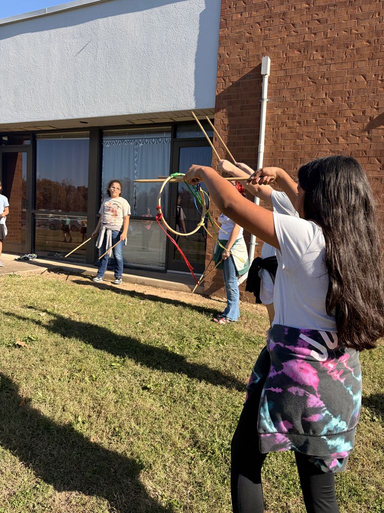 students playing traditional Cherokee games