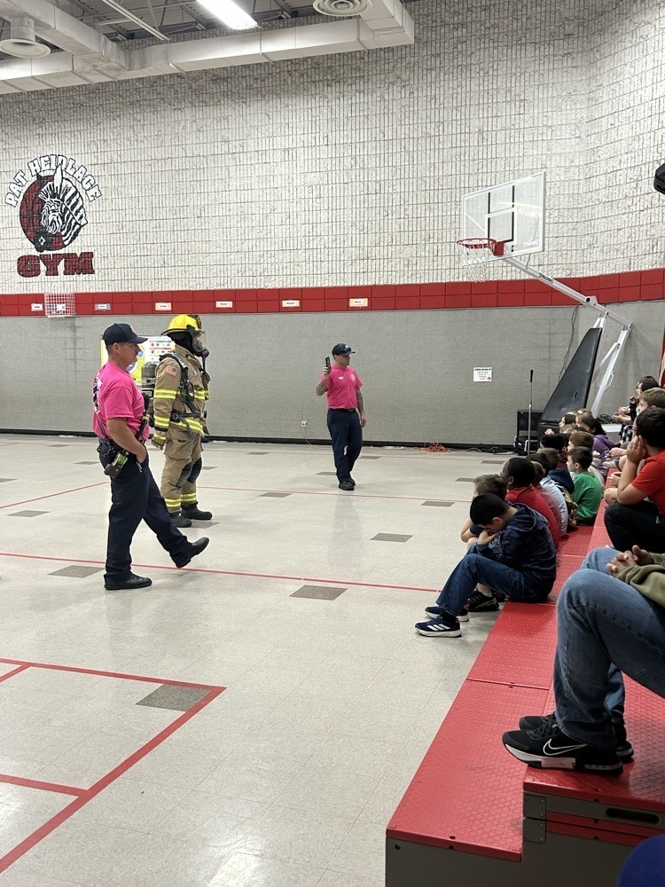 Claremore Firefighters shooting hoops with Westside students