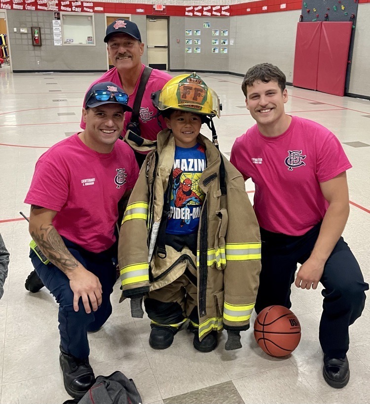 Claremore Firefighters shooting hoops with Westside students
