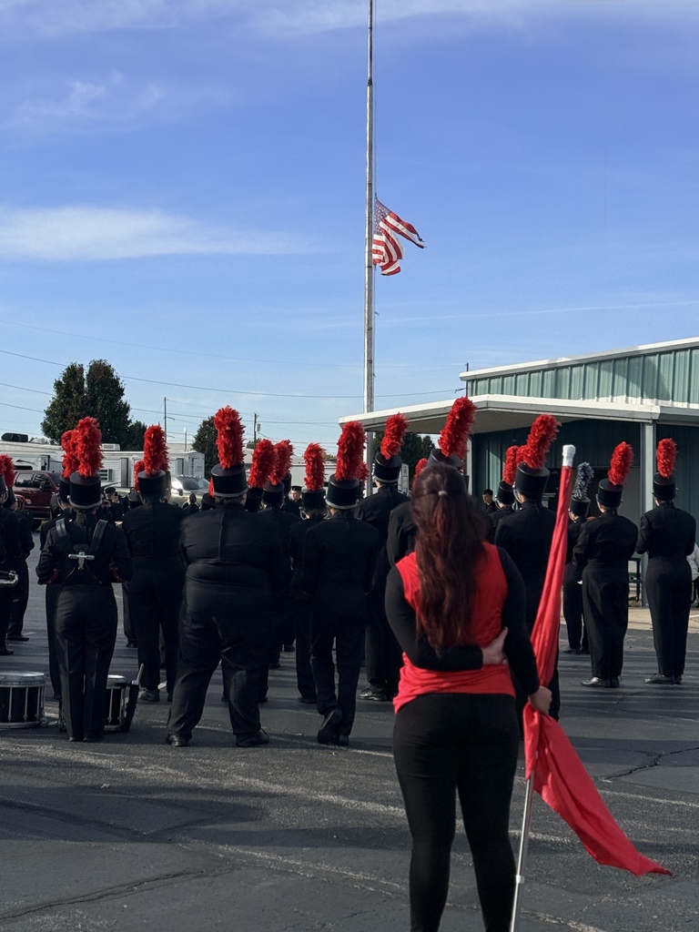 Claremore Band Students standing at a flag retirement ceremony 