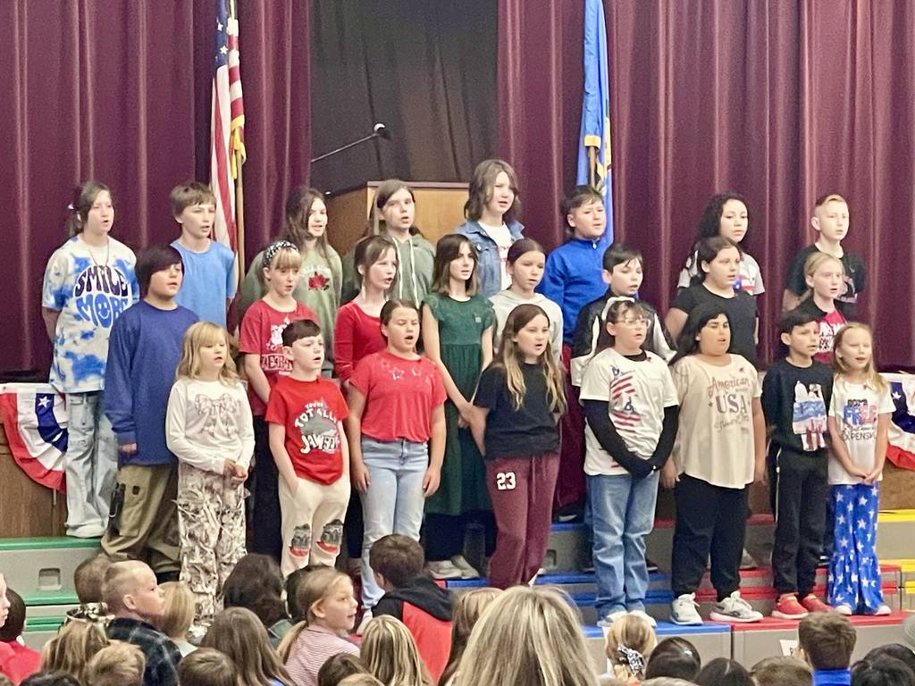 Roosa Elementary Honor Choir singing at their schools veterans day program