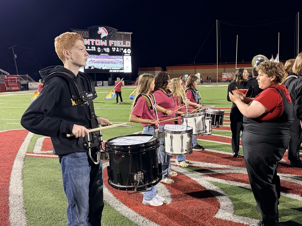 WRJH Drumline on the field at the half