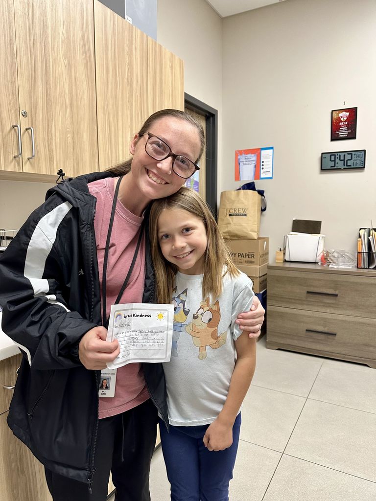 nurse and student with kindness paper