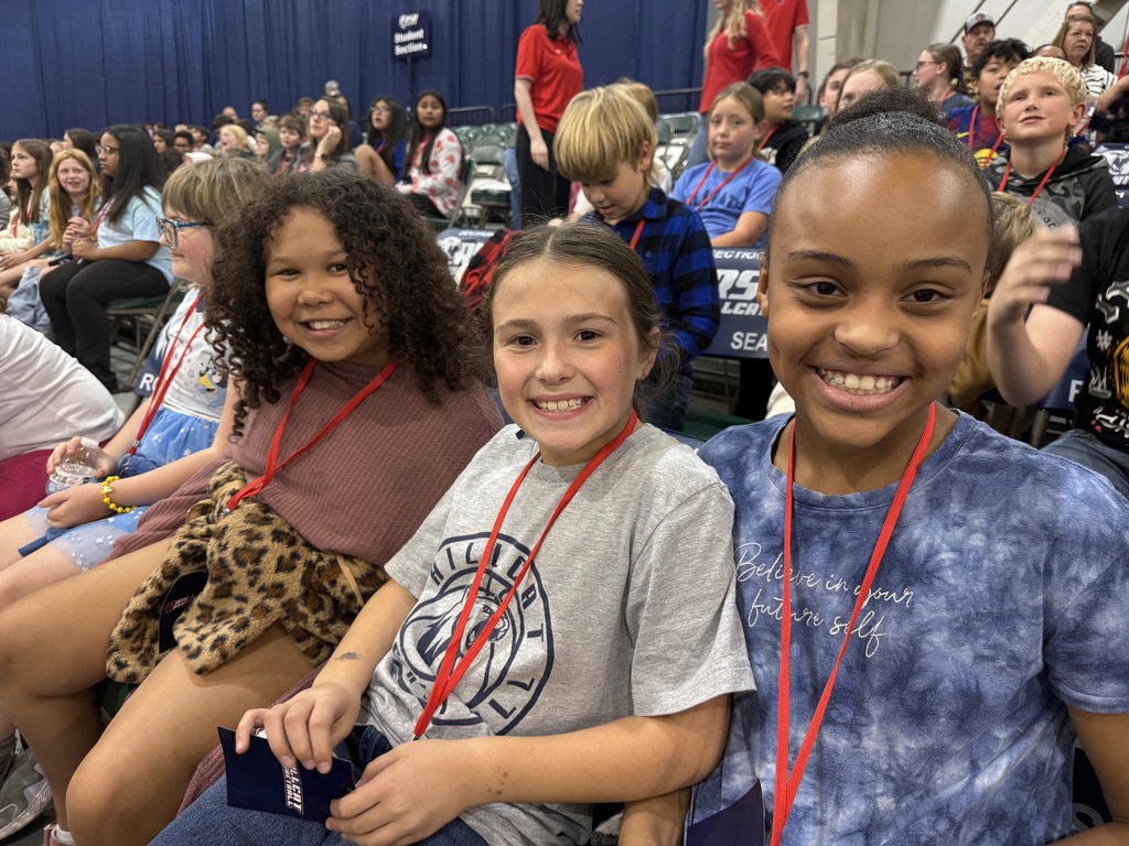 student smiling at RSU game