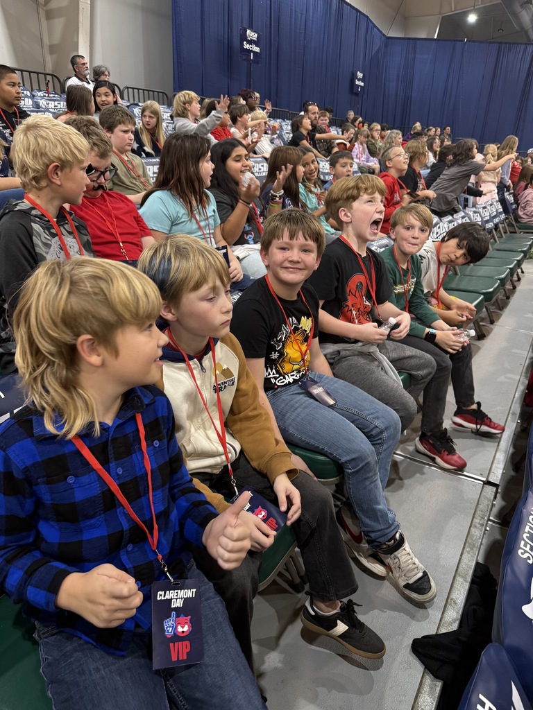 student smiling at RSU game