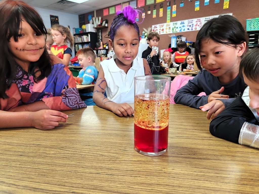 Students making lava lamps