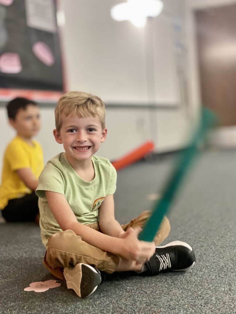 Student smiling and having fun in music