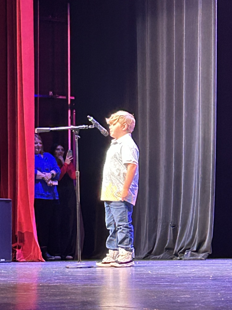 student at microphone 