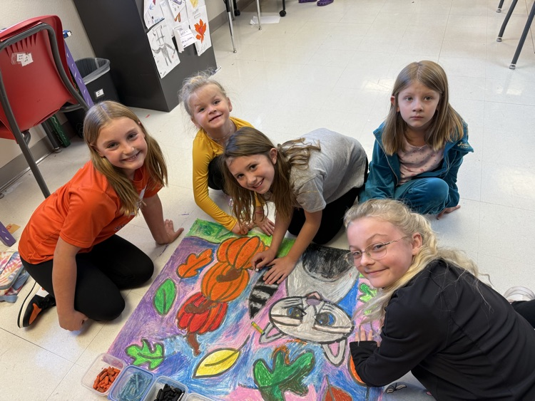 Students finishing their art work