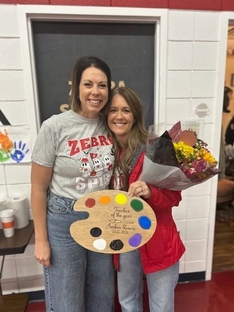 Roosa Elementary's Art teacher, Mrs. Reavis was awarded the Teacher of the Year award.