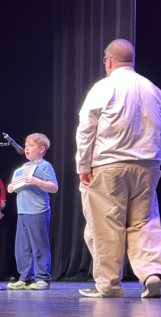 student holding flag