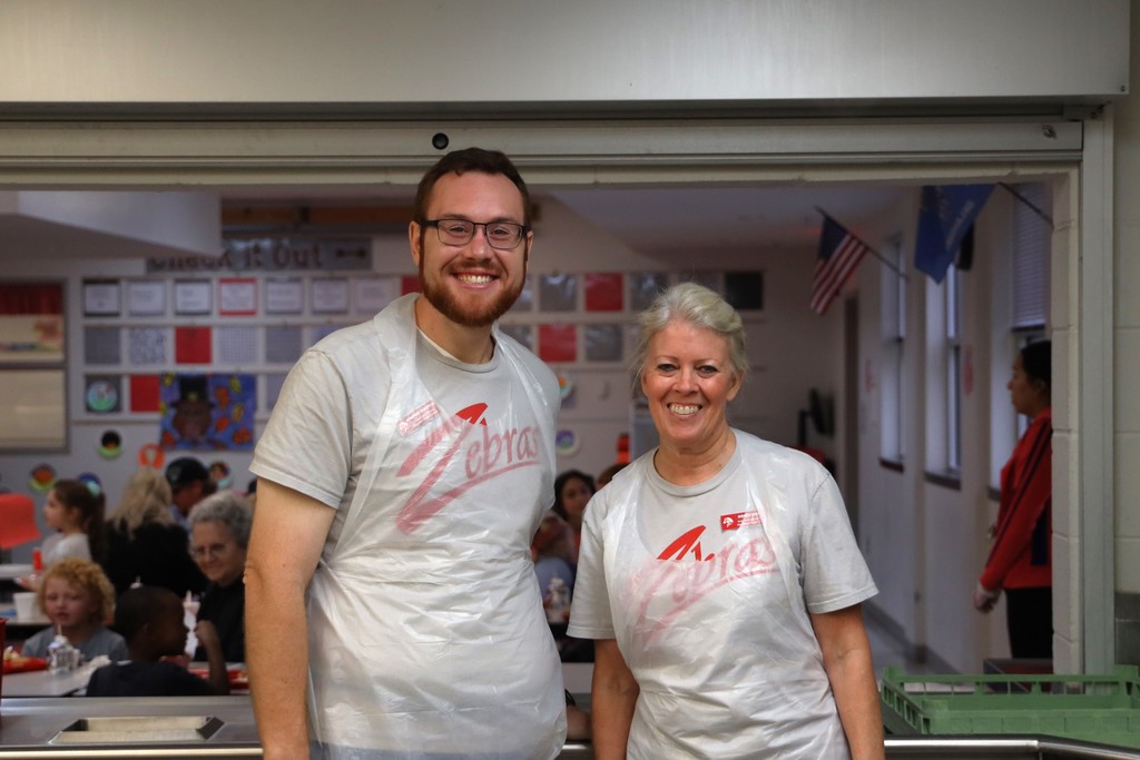 staff serving thanksgiving meal