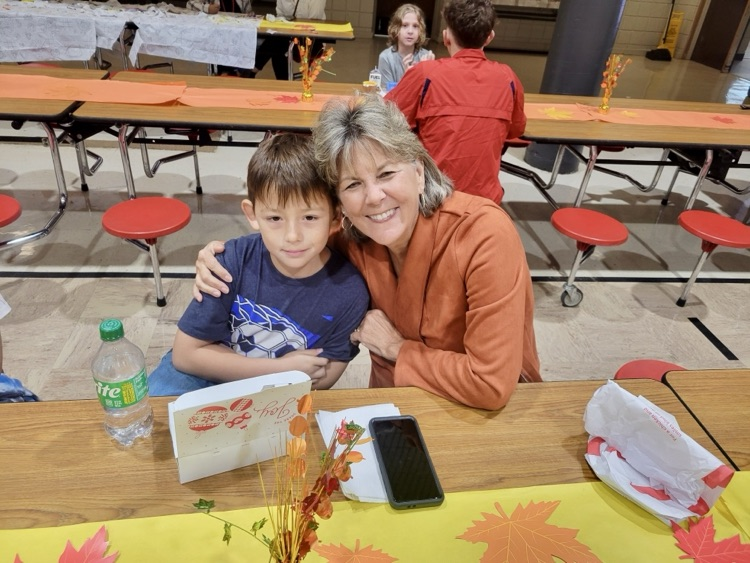 student and family eating