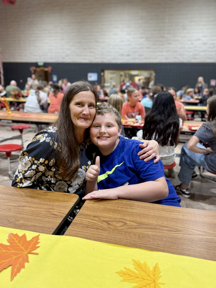 student and family eating