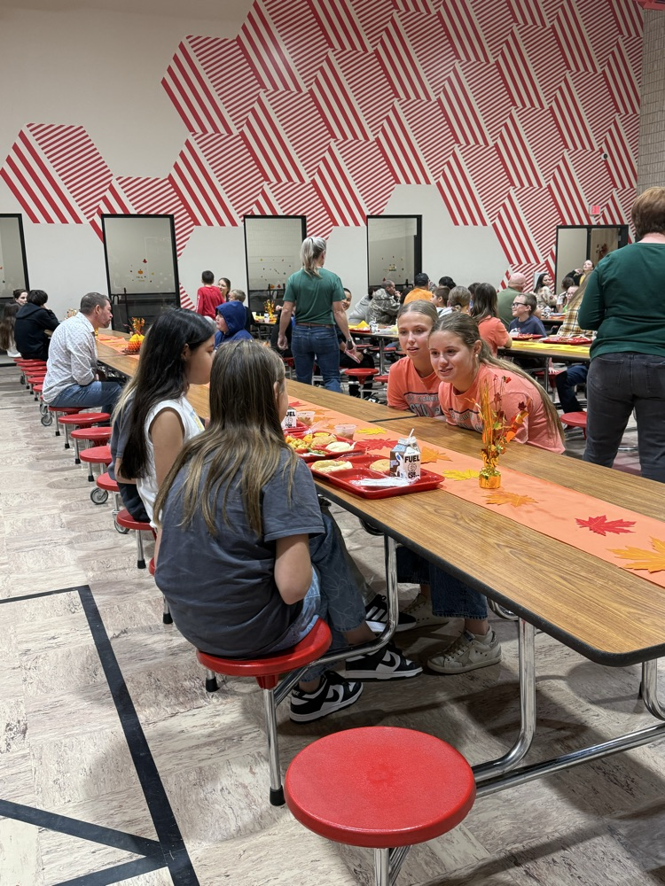 student and family eating