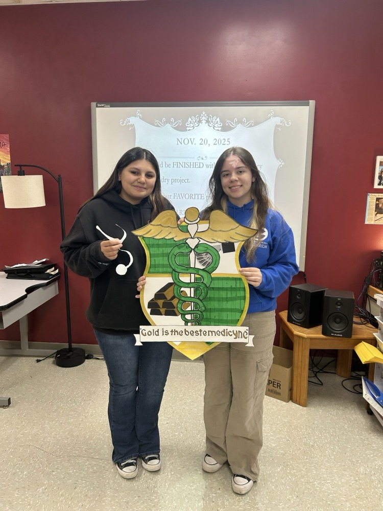 students with coat at arms