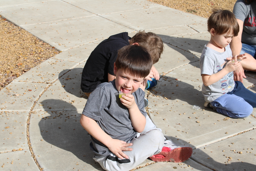 student waiting to drink pickle juice