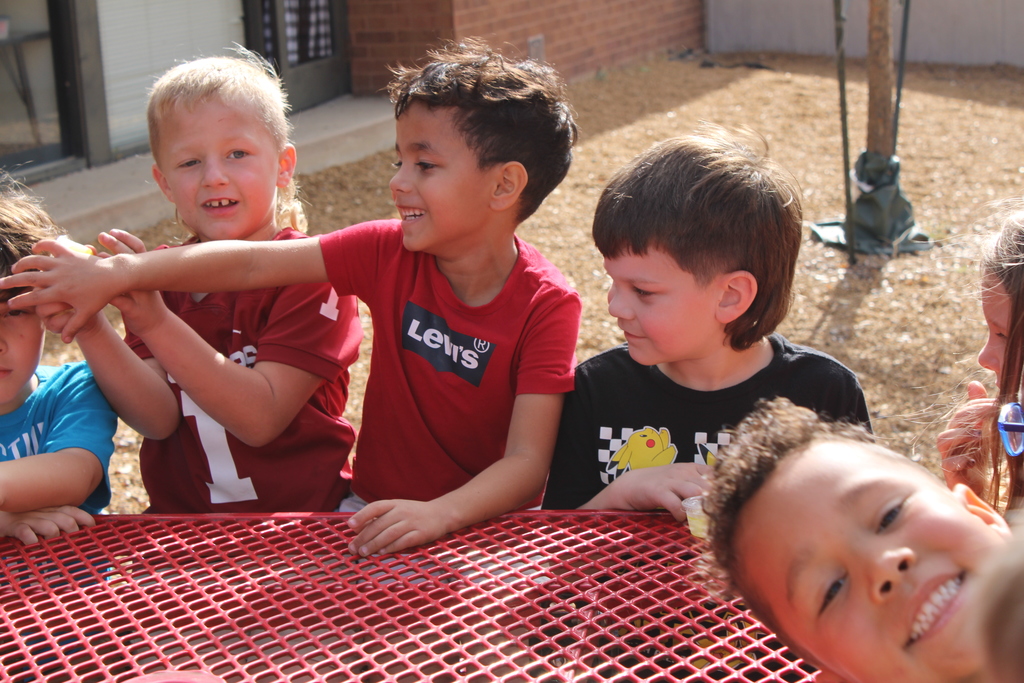 student waiting to drink pickle juice