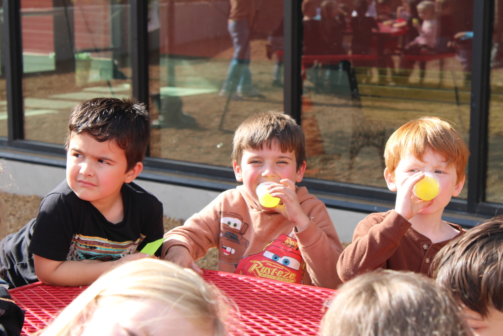 student waiting to drink pickle juice