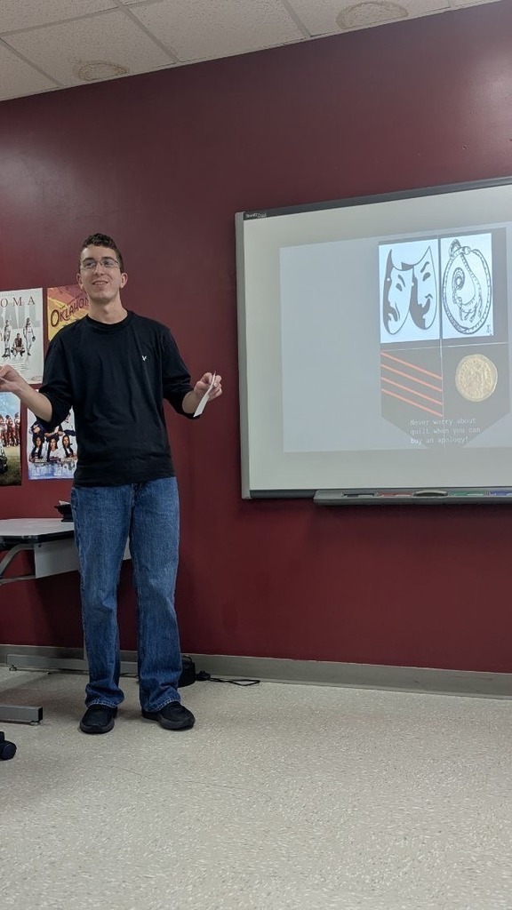 students in english class doing a presentation