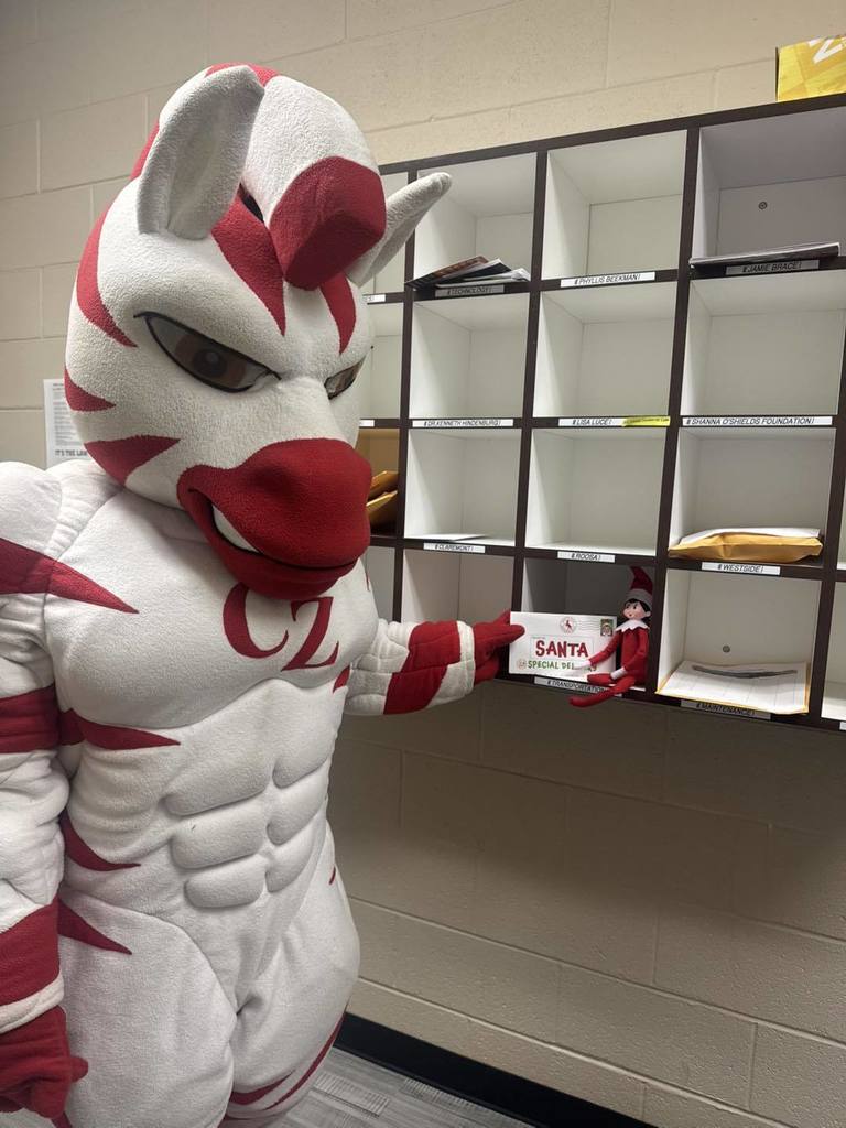 zebra mascot with elf on the shelf