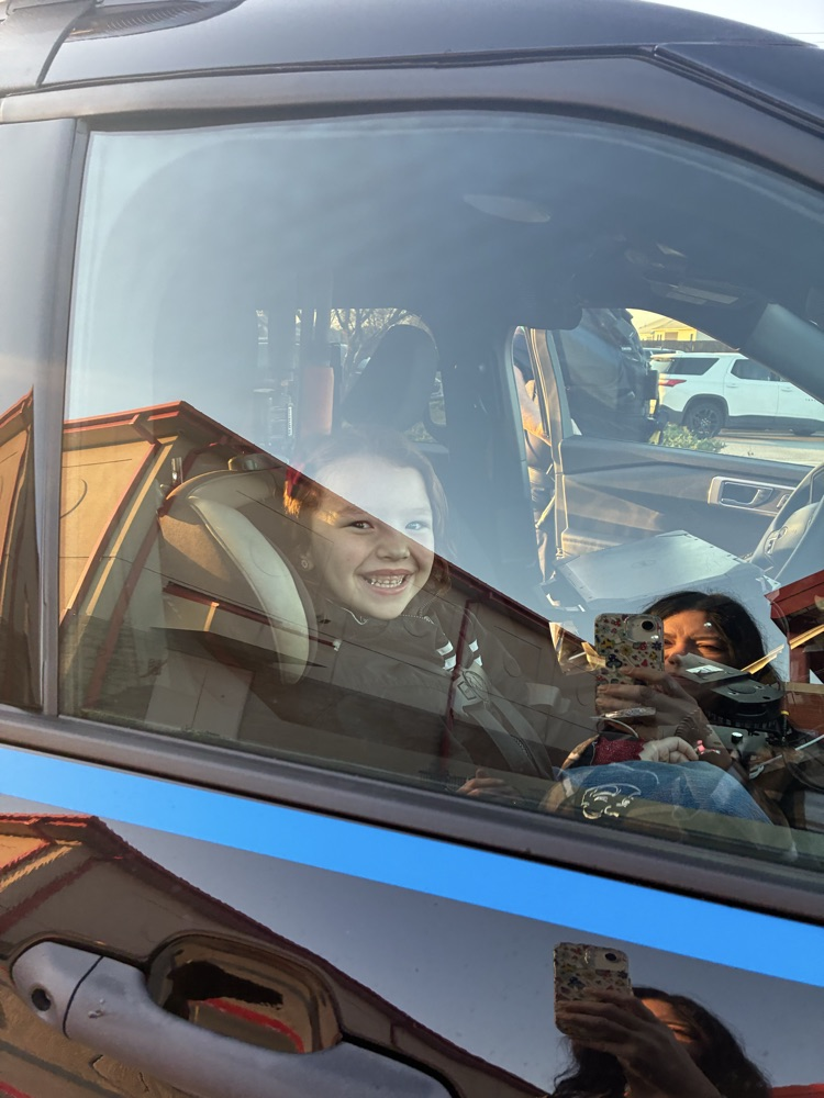 ride to school in a police car