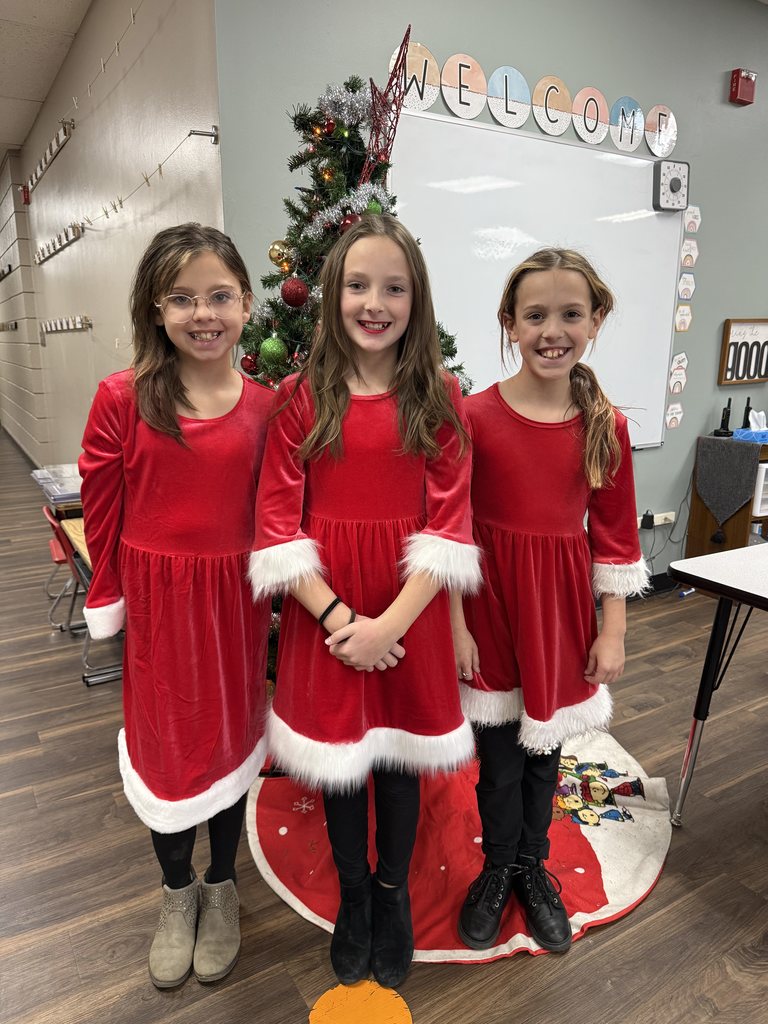 students matching in red dresses