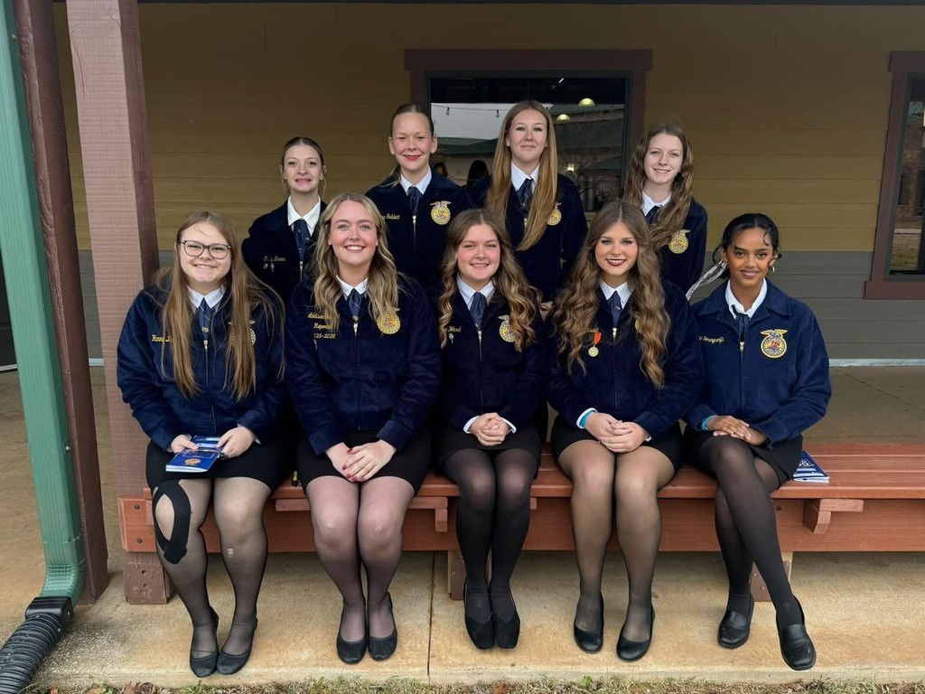 FFA officer in official uniform on bench