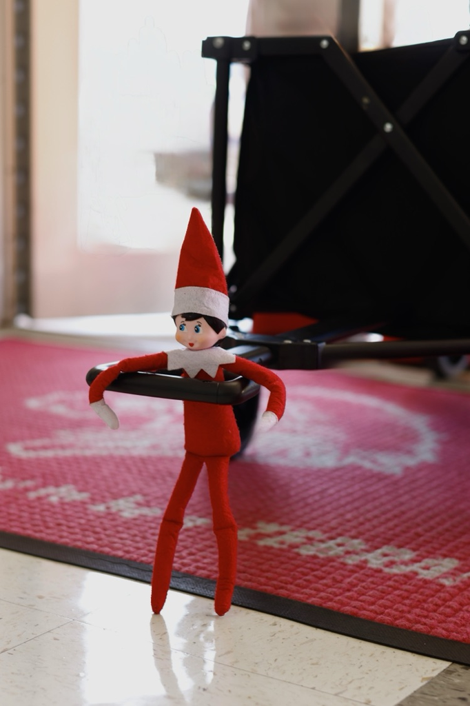 Dazzle the elf carrying her “backpack” for anything but a backpack day