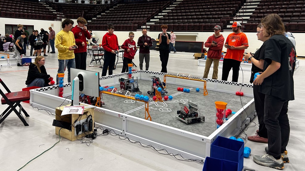 robotic teams around a competition field 