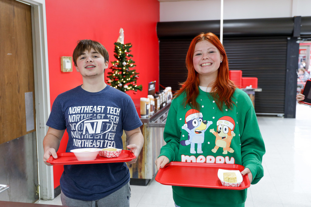 High school students with their Gumbo and rice.