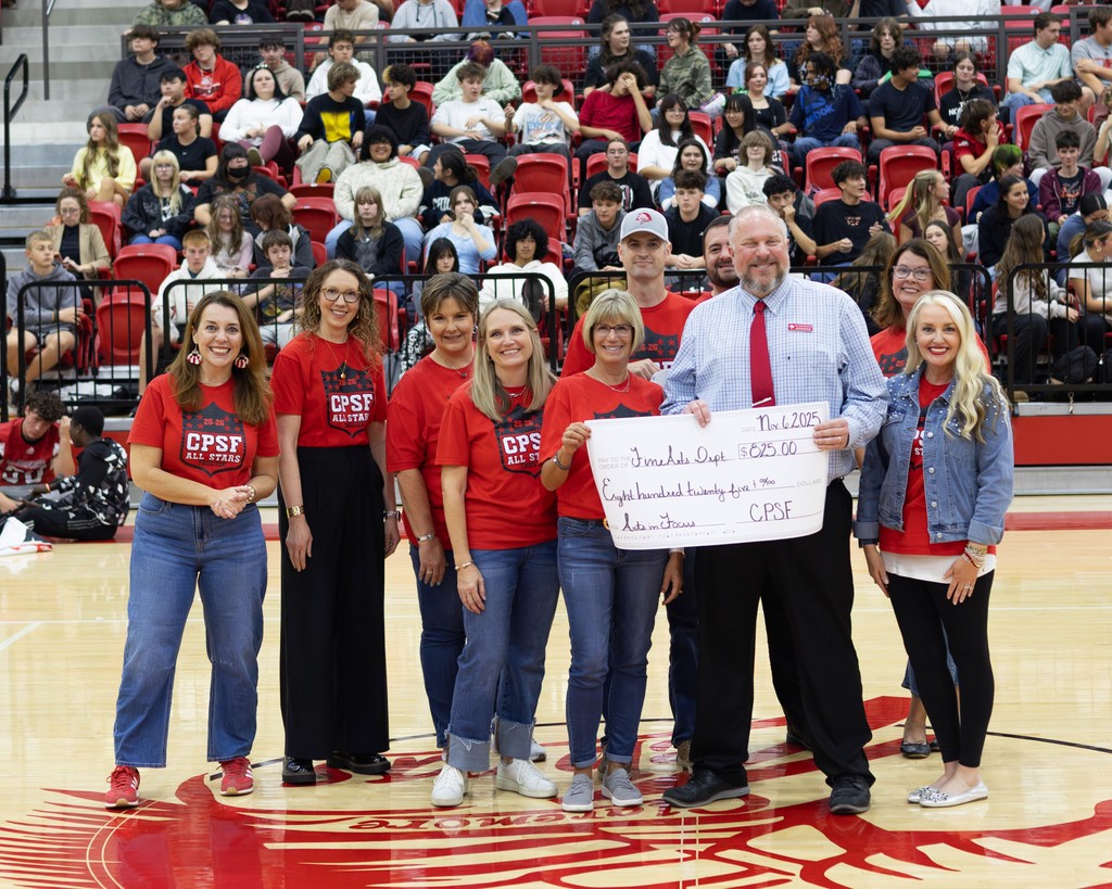 dr. adkins recieving a grant for the arts department