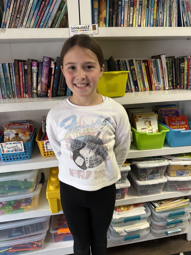 student wearing rock and roll gear