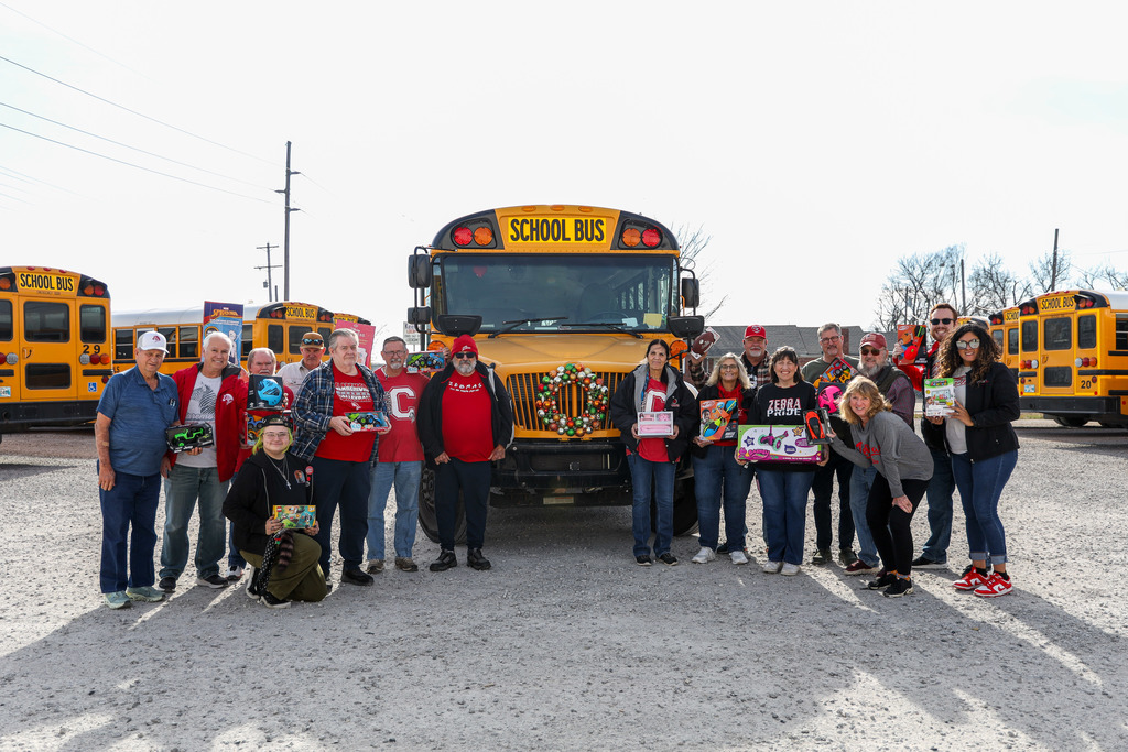 Claremore Public School Bus Driver's posing with the Toys they donated.