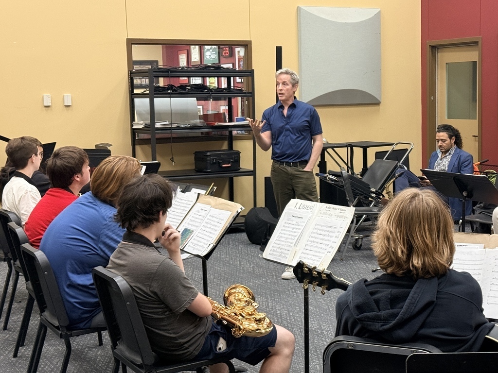 Dr. Tommy Poole talking to the CHS Jazz Bands