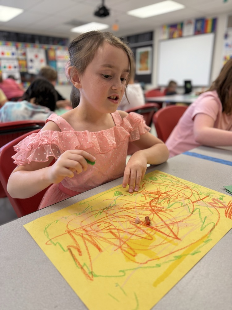 Student working on art in WIN