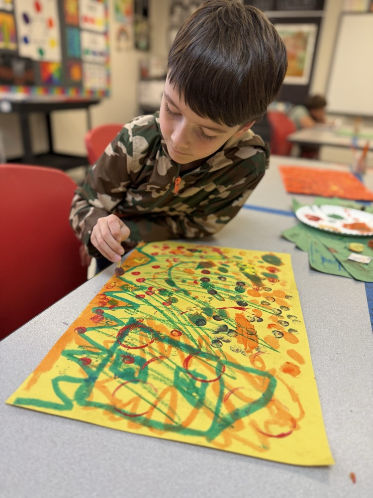 Student working on his art