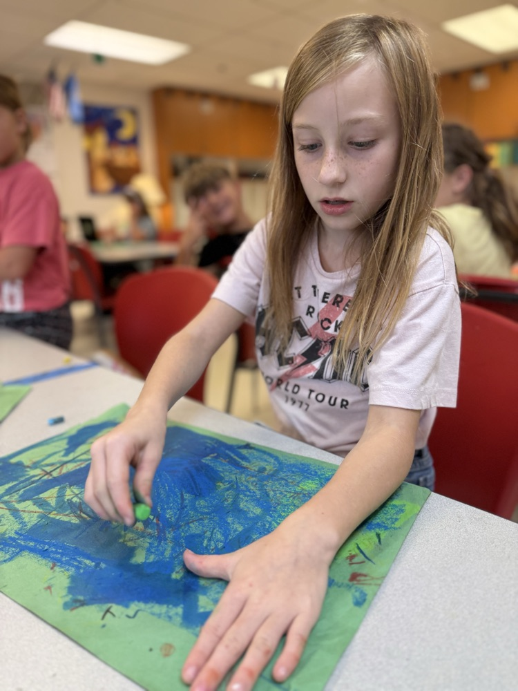 Student working in art