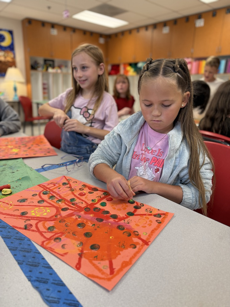 Students enjoying art