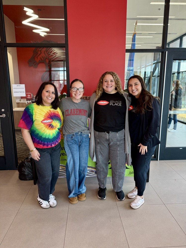 the brace place staff and school nurse smiling 